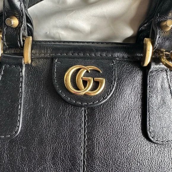 Gucci black leather Rebelle Bag with shoulder strap and dust bag Totes